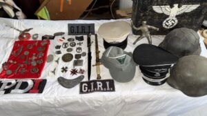 Allanaron por una causa de tenencia de armas en Rosario: descubrieron un arsenal y múltiples objetos de simbología nazi
